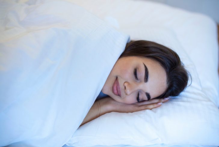 Woman sleeping peacefully at night